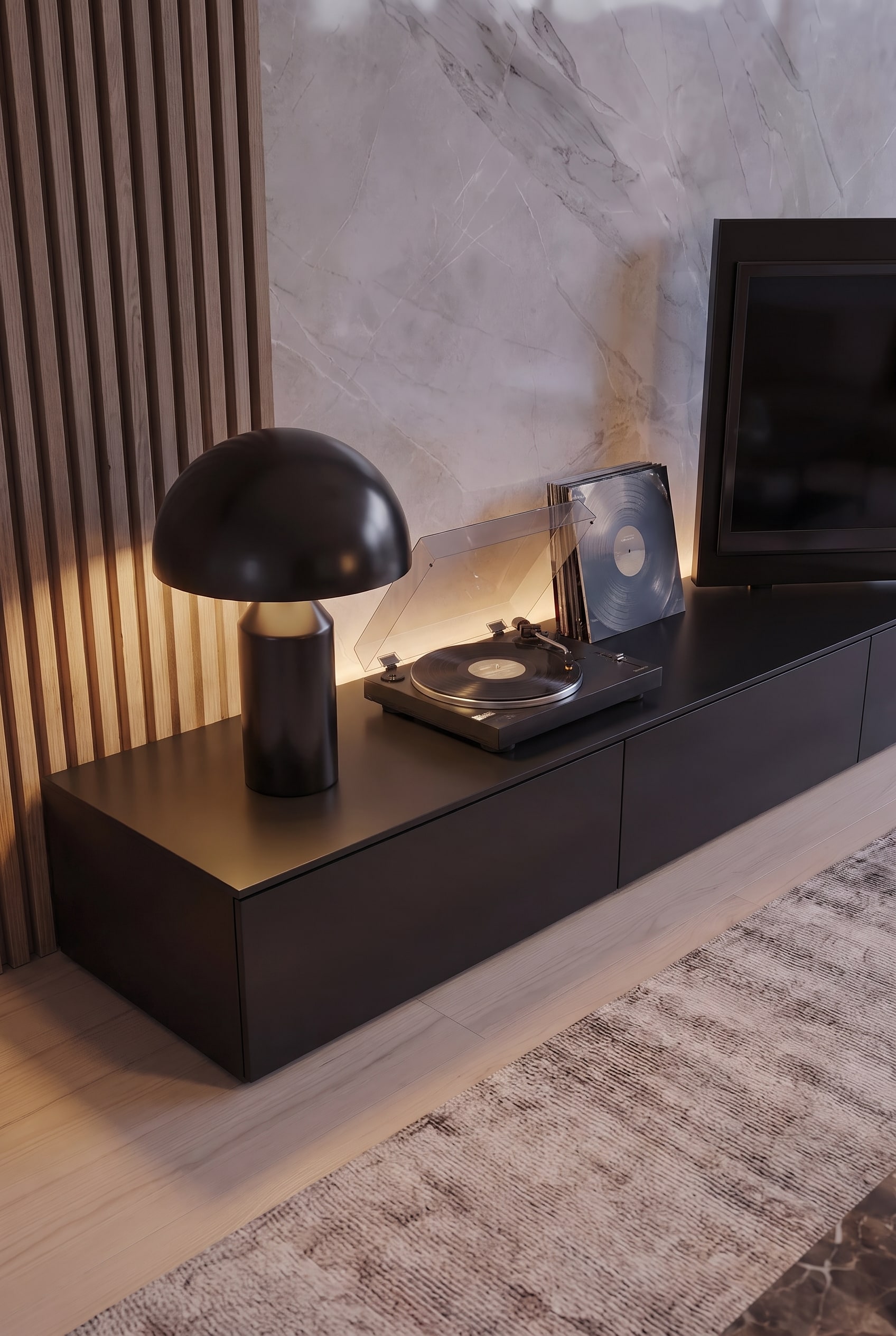 Vue détaillée d'un meuble bas noir avec platine vinyle, lampe champignon et panneau acoustique vertical en bois.