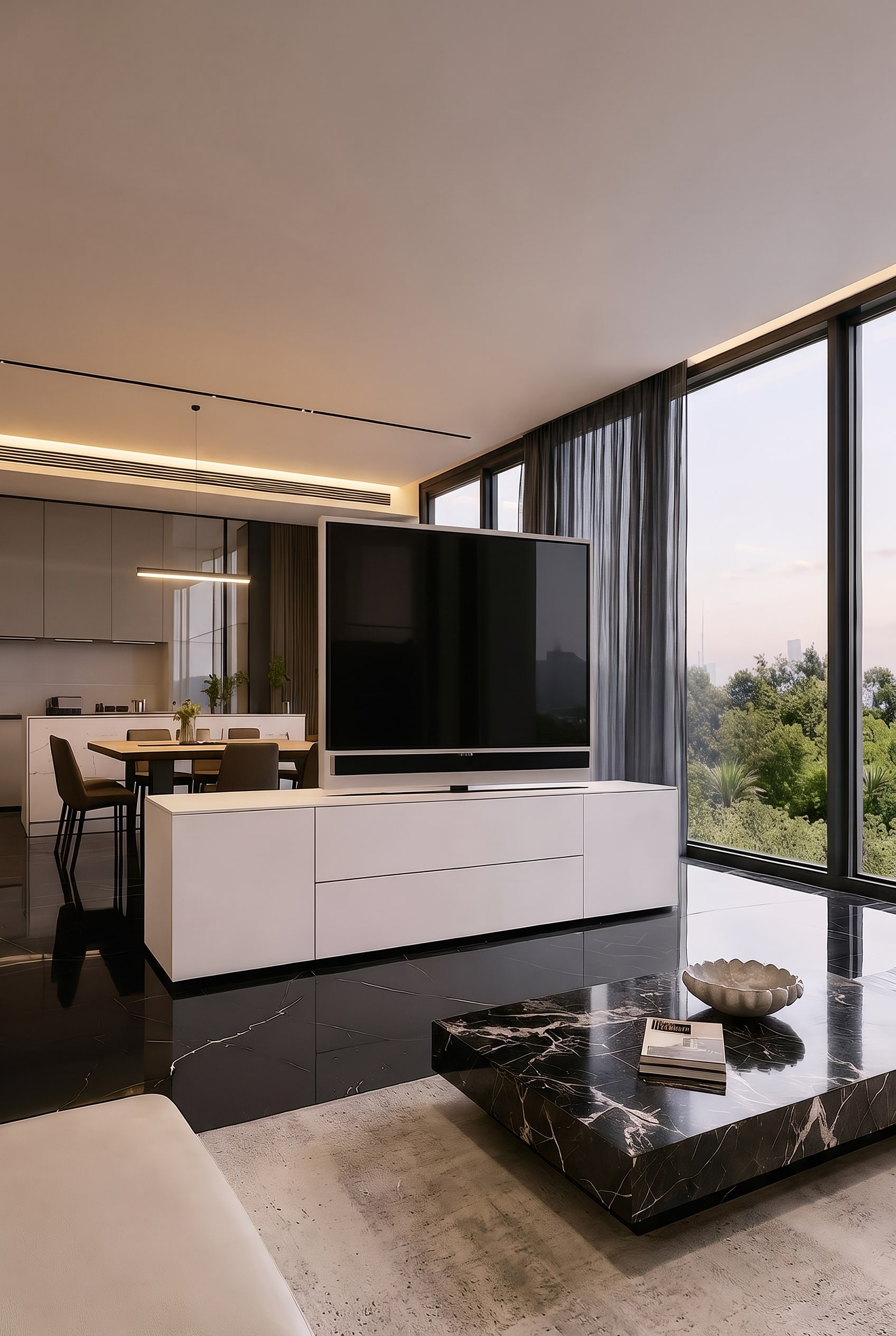 Espace de vie et salle à manger ouvert avec le Sideboard Livitalia Roto comme séparateur de pièce et panneau TV pivotant
