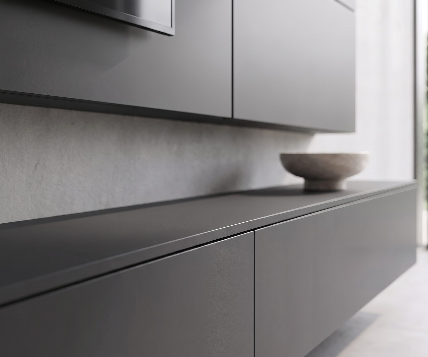 Livitalia C102 tv-wandmeubel zwevend lowboard Livitalia C102 tv-meubel: Zwevend lowboard in mat donkergrijs voor een moderne, strakke woonkamer.