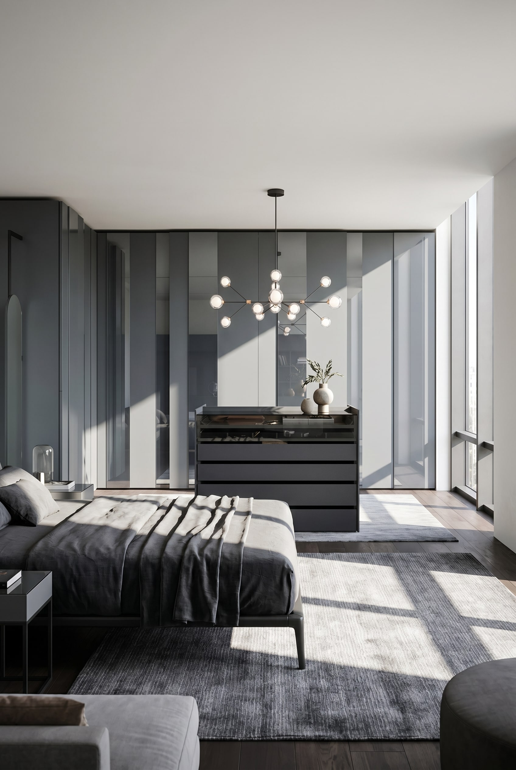 &Eacute;l&eacute;gant &icirc;lot-dressing sombre avec couvercle en verre et tiroirs au milieu d'un dressing lumineux avec sol en terrazzo