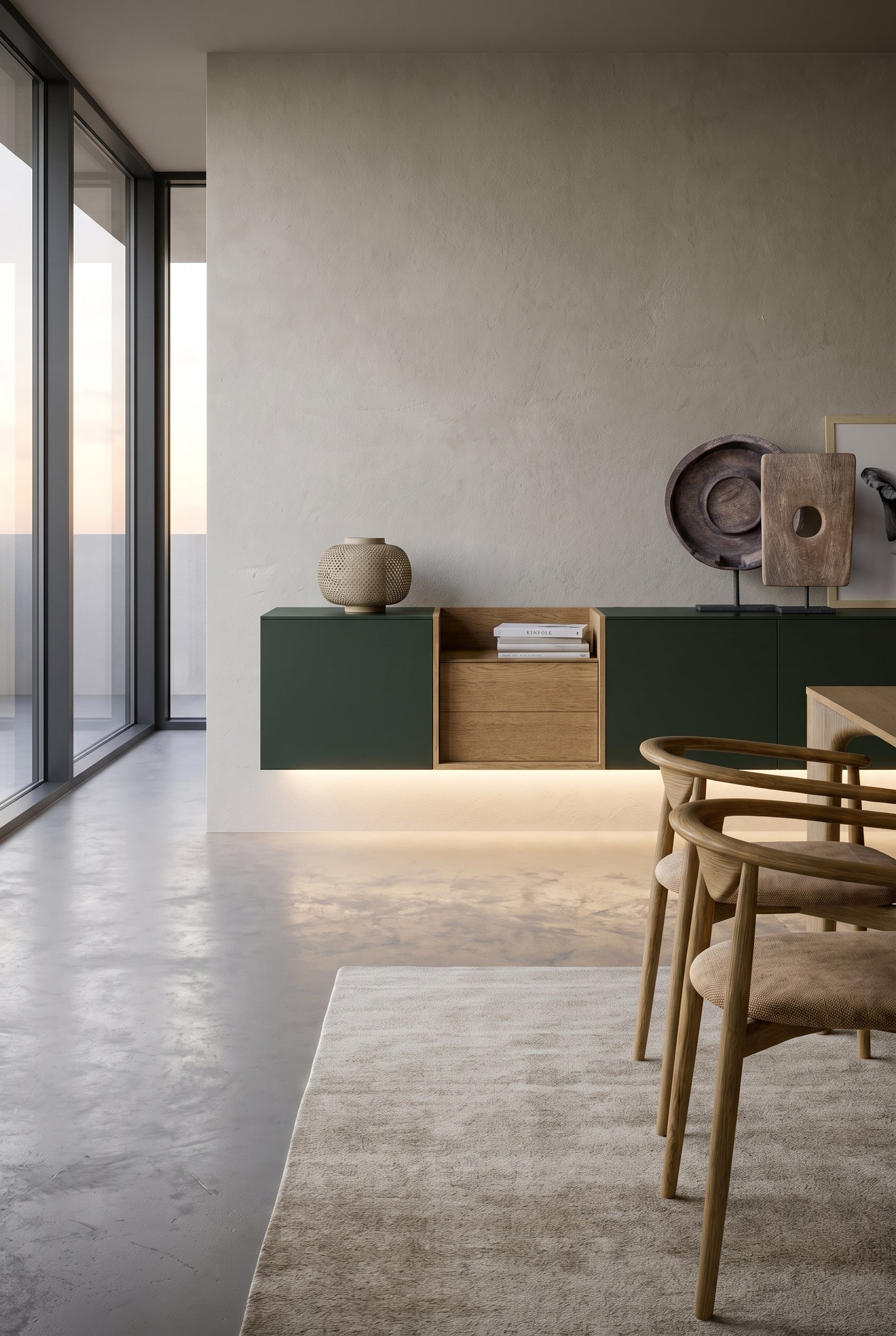 Salle &agrave; manger minimaliste avec sideboard mural, &eacute;clairage indirect du socle et un tapis &eacute;l&eacute;gant