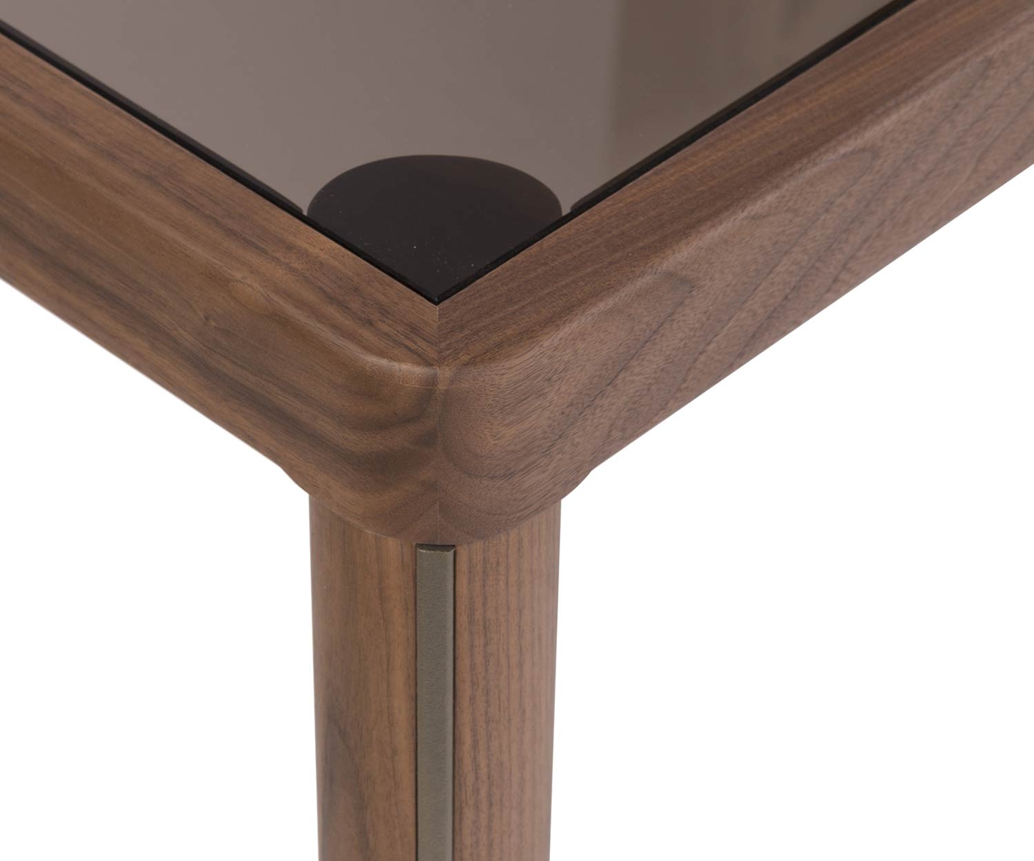 Design exclusif table à manger détail coin avec plateau en verre et pied en noyer en vue Design exclusif table à manger détail coin avec plateau en verre et pied en noyer en vue