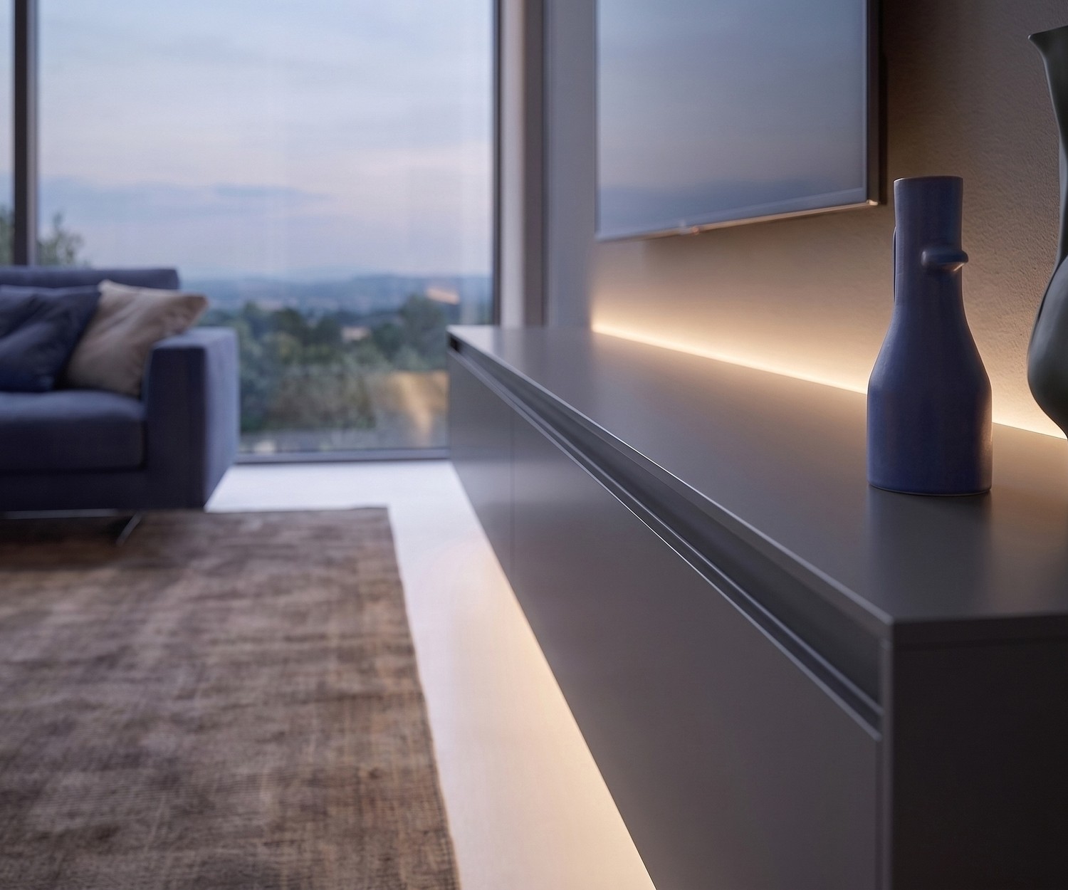 Zwevend TV-meubel Reverse met LED-verlichting Zwevend TV-meubel Reverse van Novamobili in de woonkamer. Modern grijs lowboard met sfeervolle LED-verlichting.