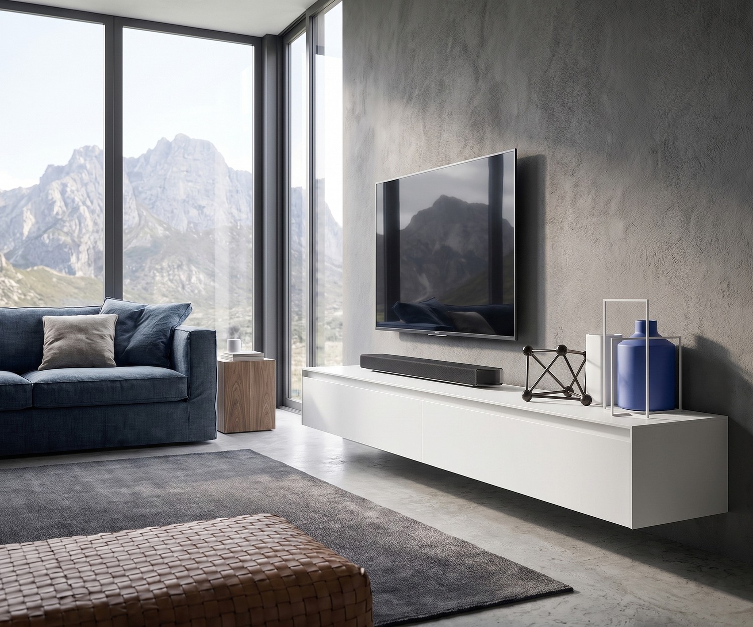 Zwevend tv-meubel Reverse van Novamobili in een moderne woonkamer met betonnen wand