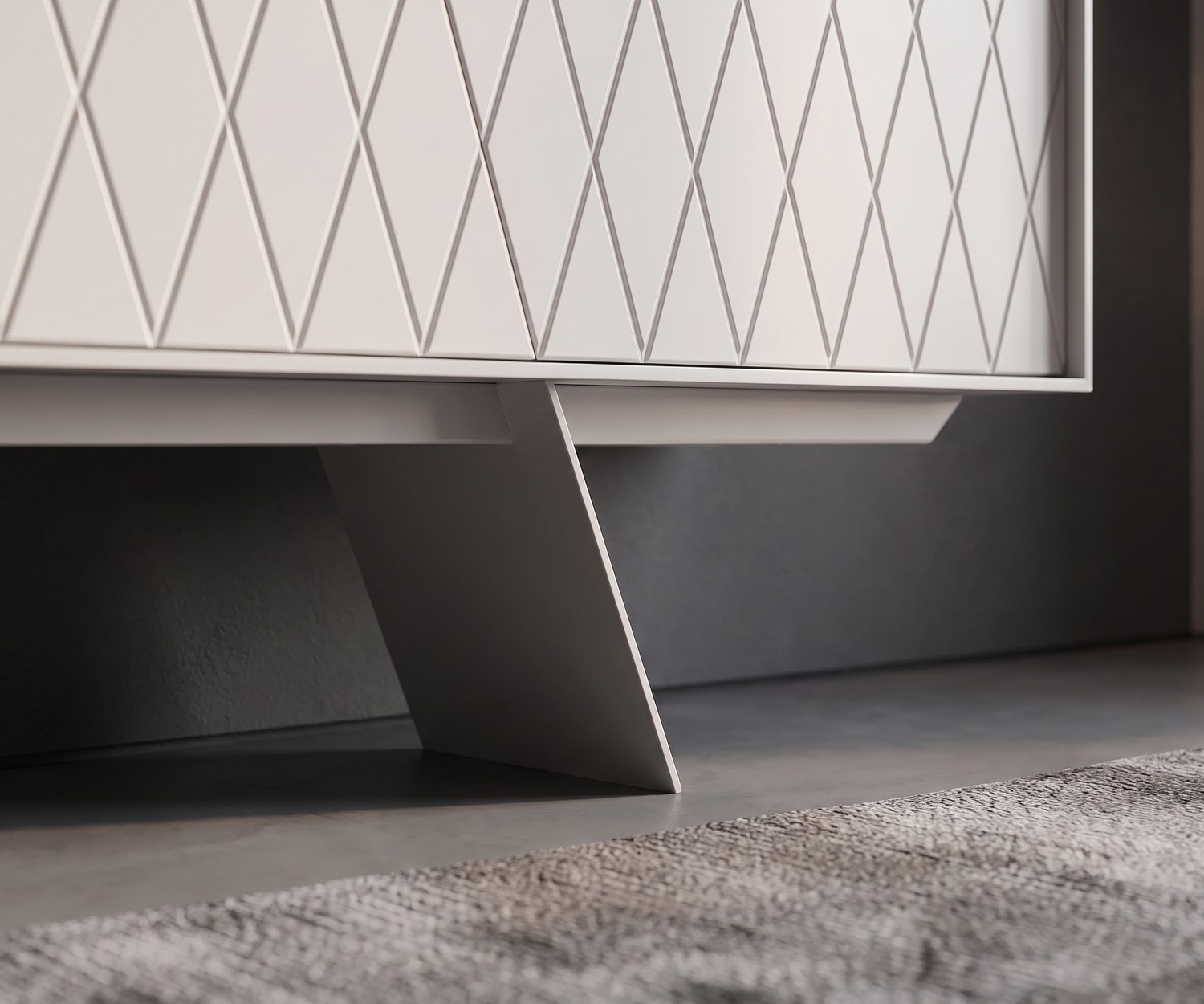 Buffet al2 e-klipse 003 avec motif à losanges dans un salon moderne, buffet design blanc devant un mur gris.