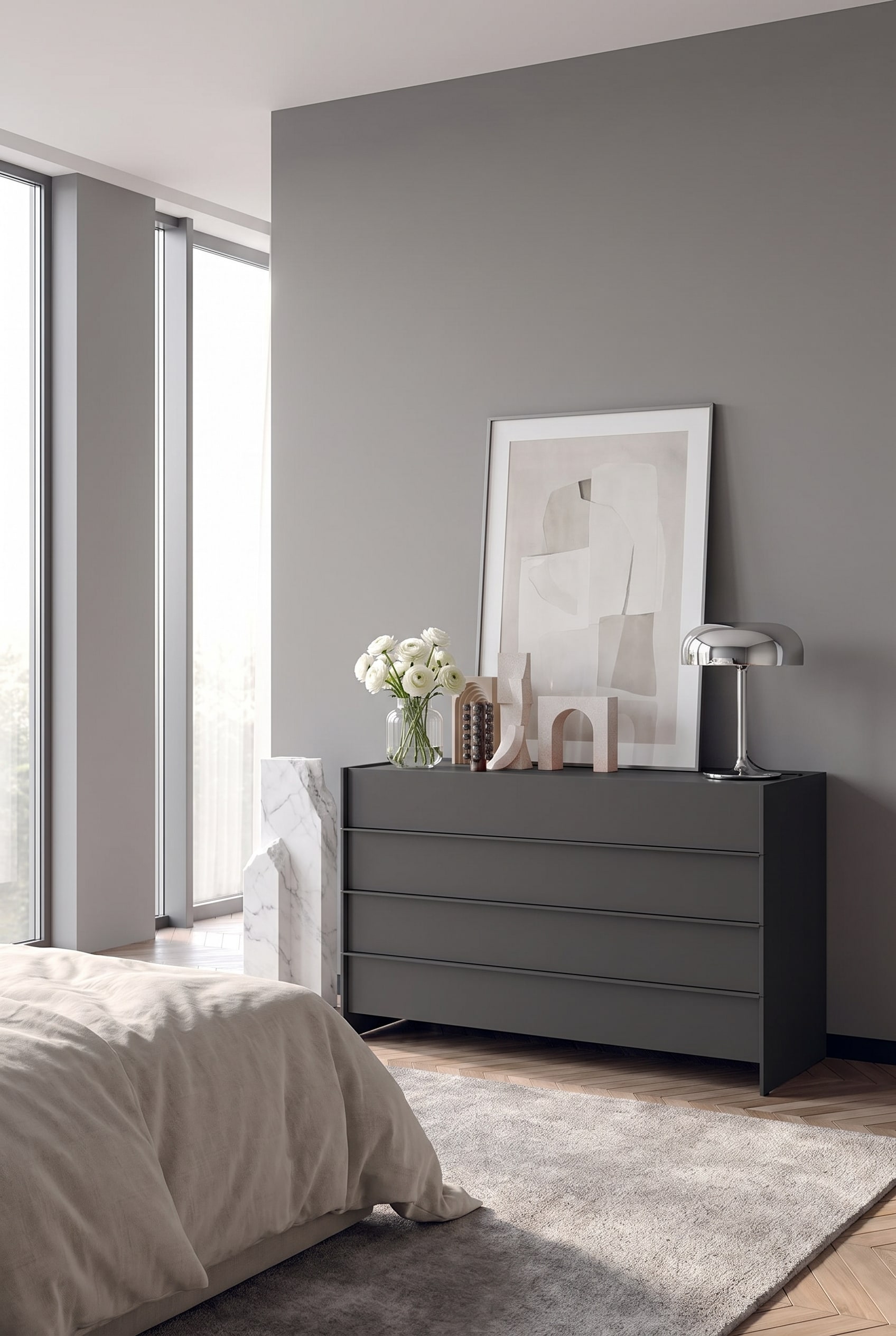 Commode minimaliste sans poignée en gris clair, se fondant ton sur ton avec le mur de la chambre à coucher