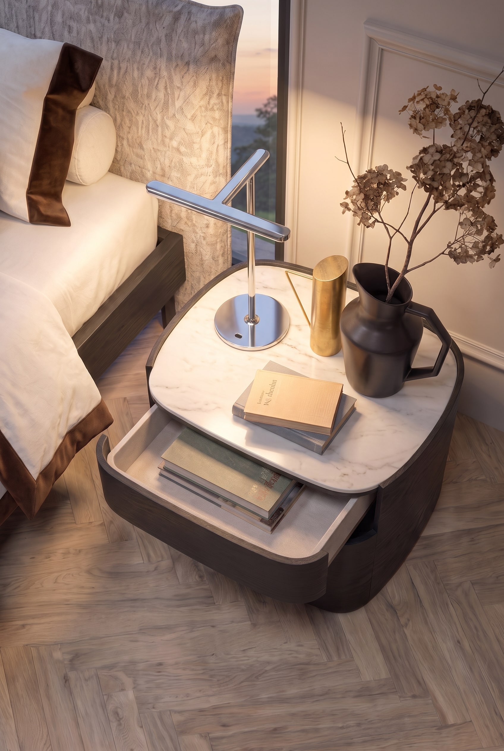 Vue de dessus du plateau en marbre blanc et du tiroir ouvert d'une table de chevet design.