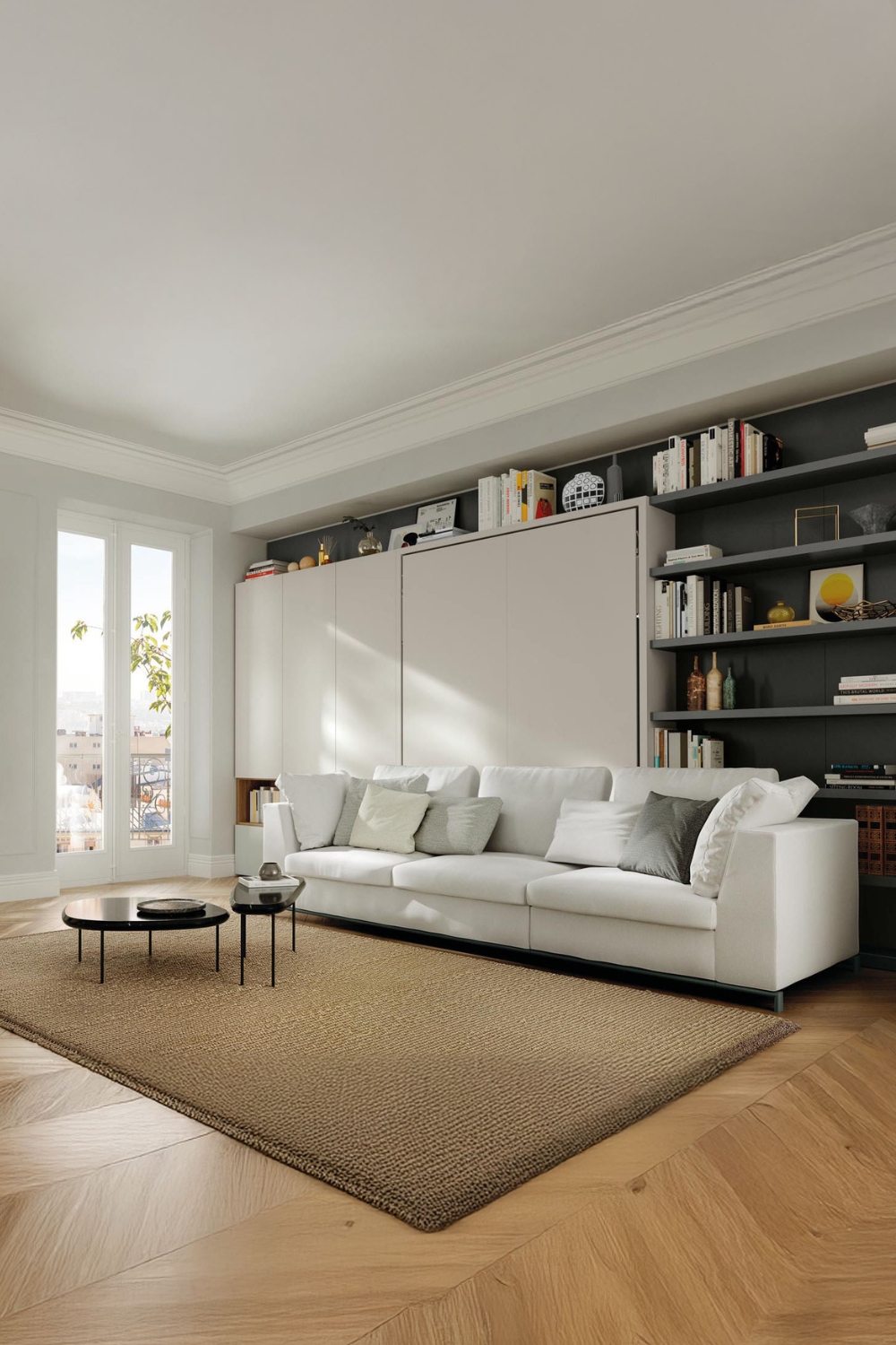 lit escamotable blanc puriste avec grand canap&eacute; et deux tables sombres