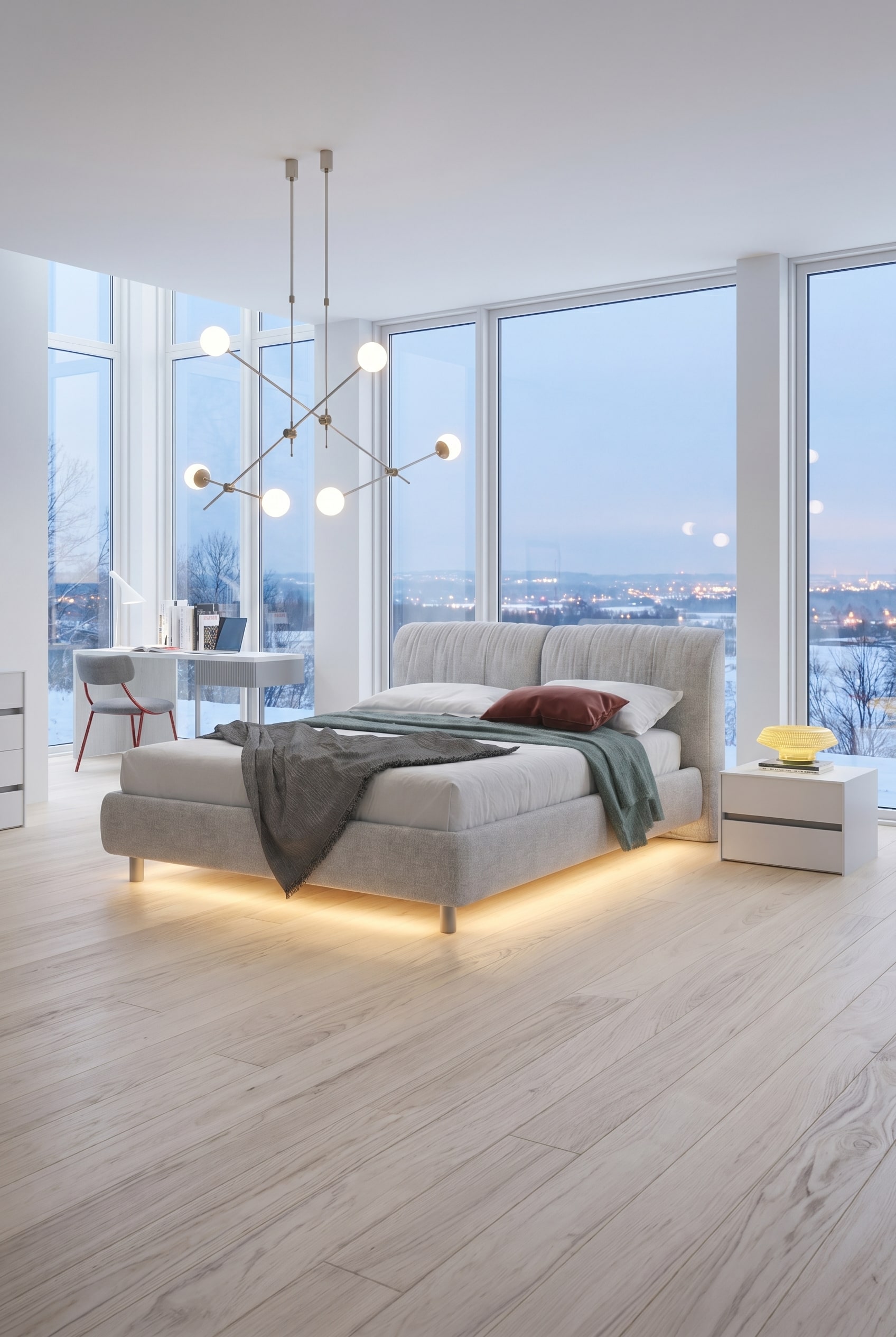 Chambre moderne avec lit rembourré gris clair, coffre de rangement invisible et spots de sol mats