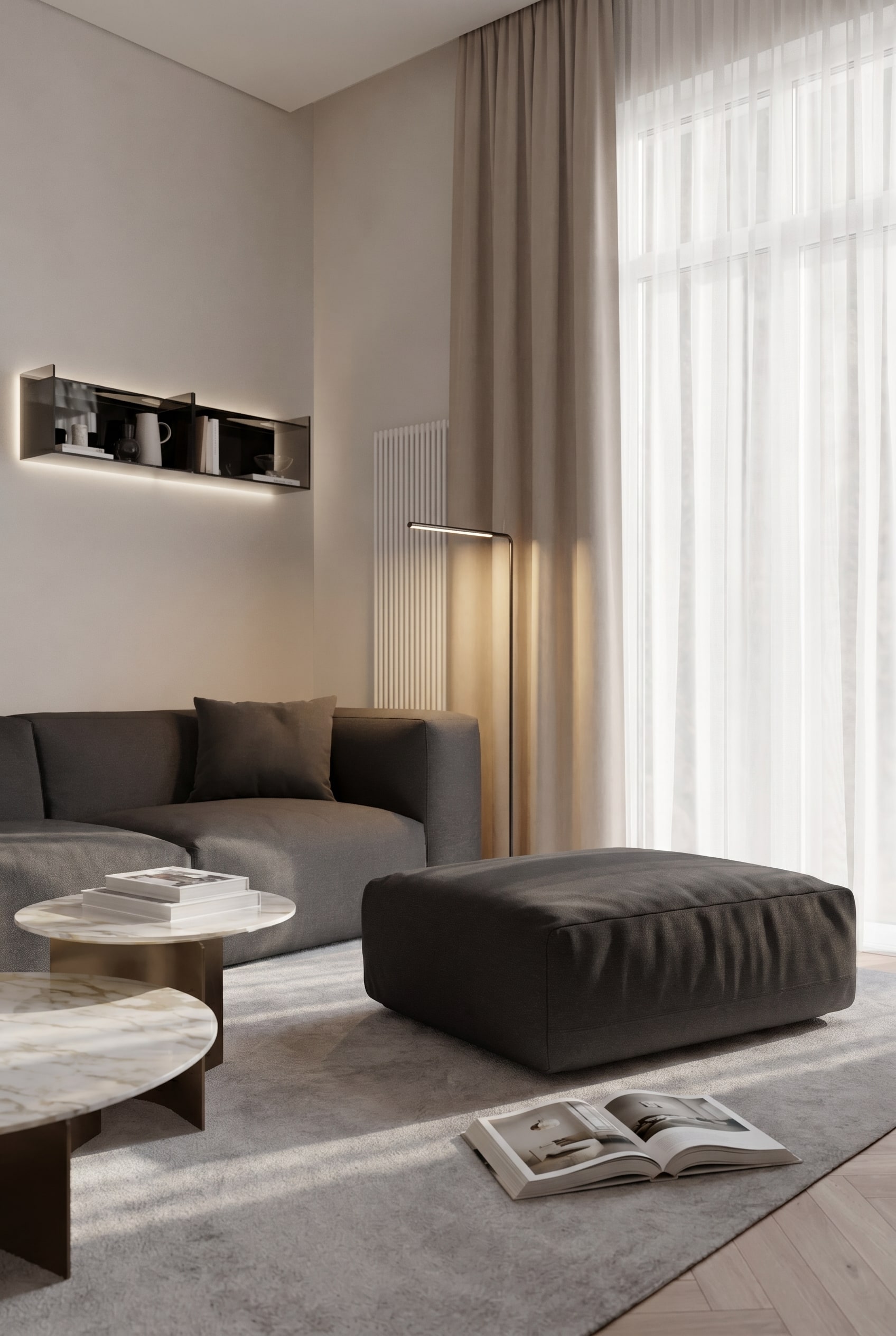 Coin lecture &eacute;l&eacute;gant avec pouf Cloud en tissu fonc&eacute;, fauteuil de relaxation assorti et un lampadaire &eacute;lanc&eacute;