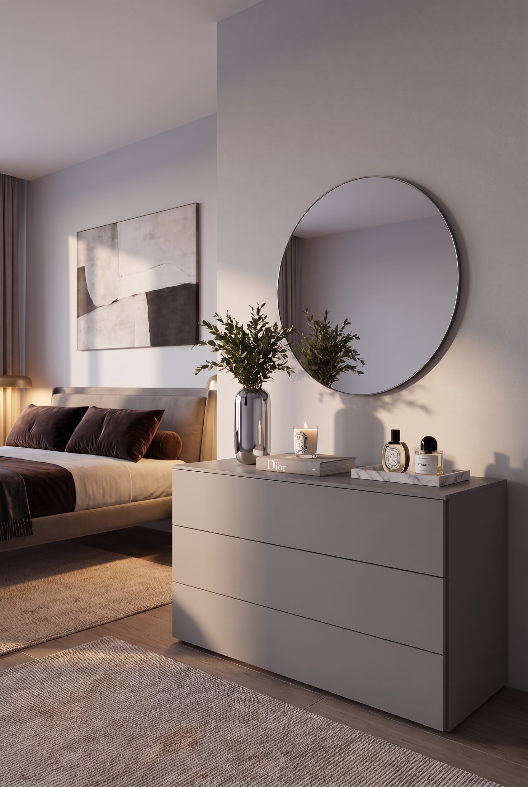 Vue frontale d'une commode design mate dans la chambre avec un miroir rond suspendu au-dessus et une lumi&egrave;re chaude.