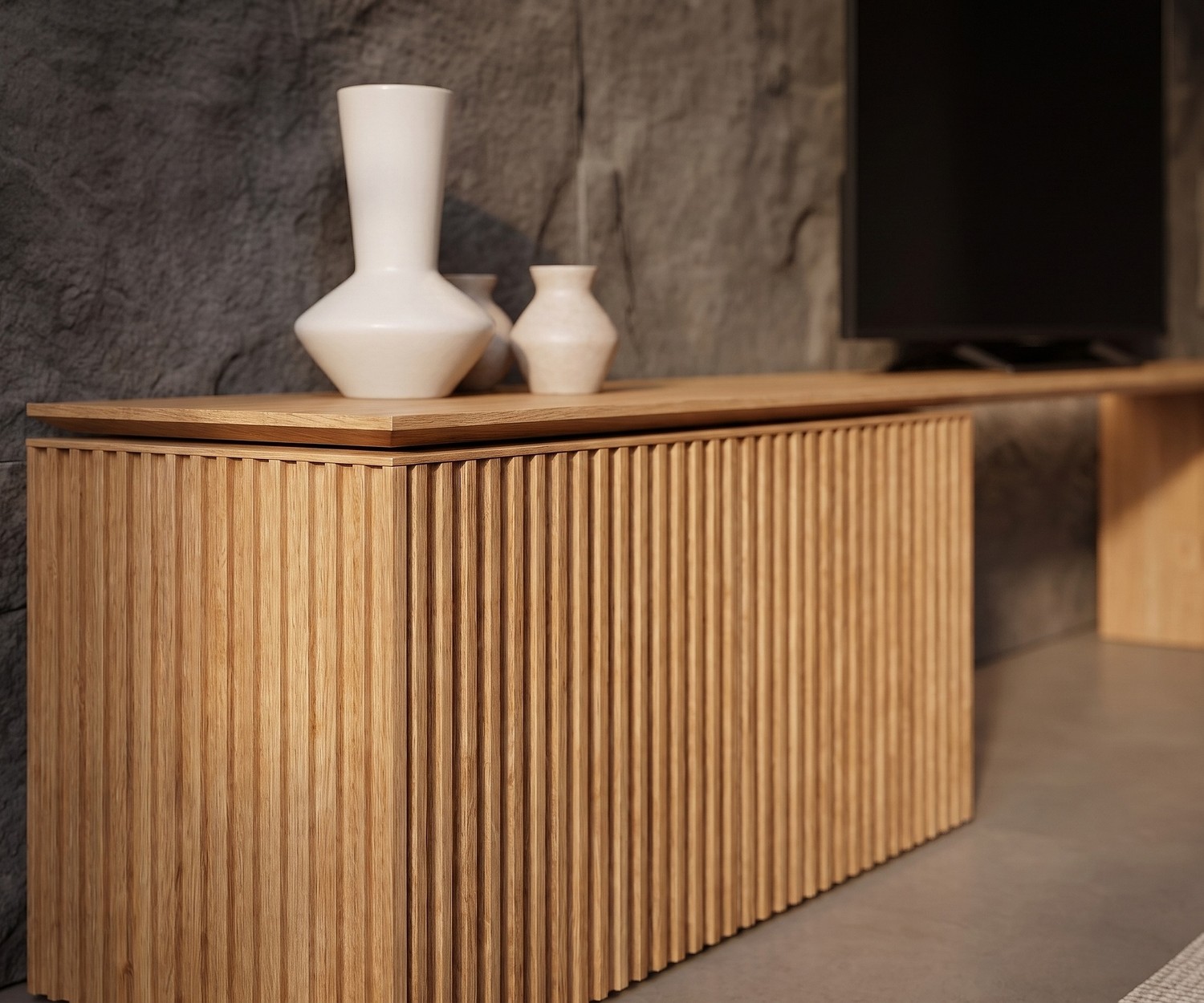 Buffet bas Punt Velasca meuble TV Buffet bas Punt Velasca en bois noir comme meuble TV design dans un salon minimaliste.