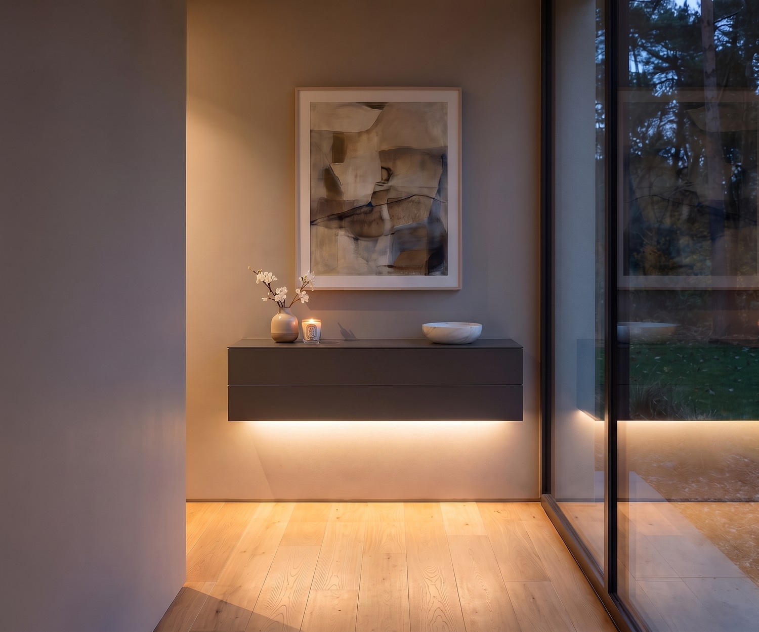 Novamobili Easy zwevende ladekast Novamobili Easy zwevend dressoir met 2 laden in de hal onder een ronde spiegel met een moderne designlamp.