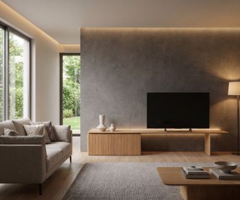 Buffet TV bas Punt Velasca en chêne massif dans un salon design et minimaliste.