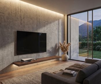 Étagère murale TV Livitalia en bois dans un salon minimaliste sous un téléviseur fixé au mur en béton.